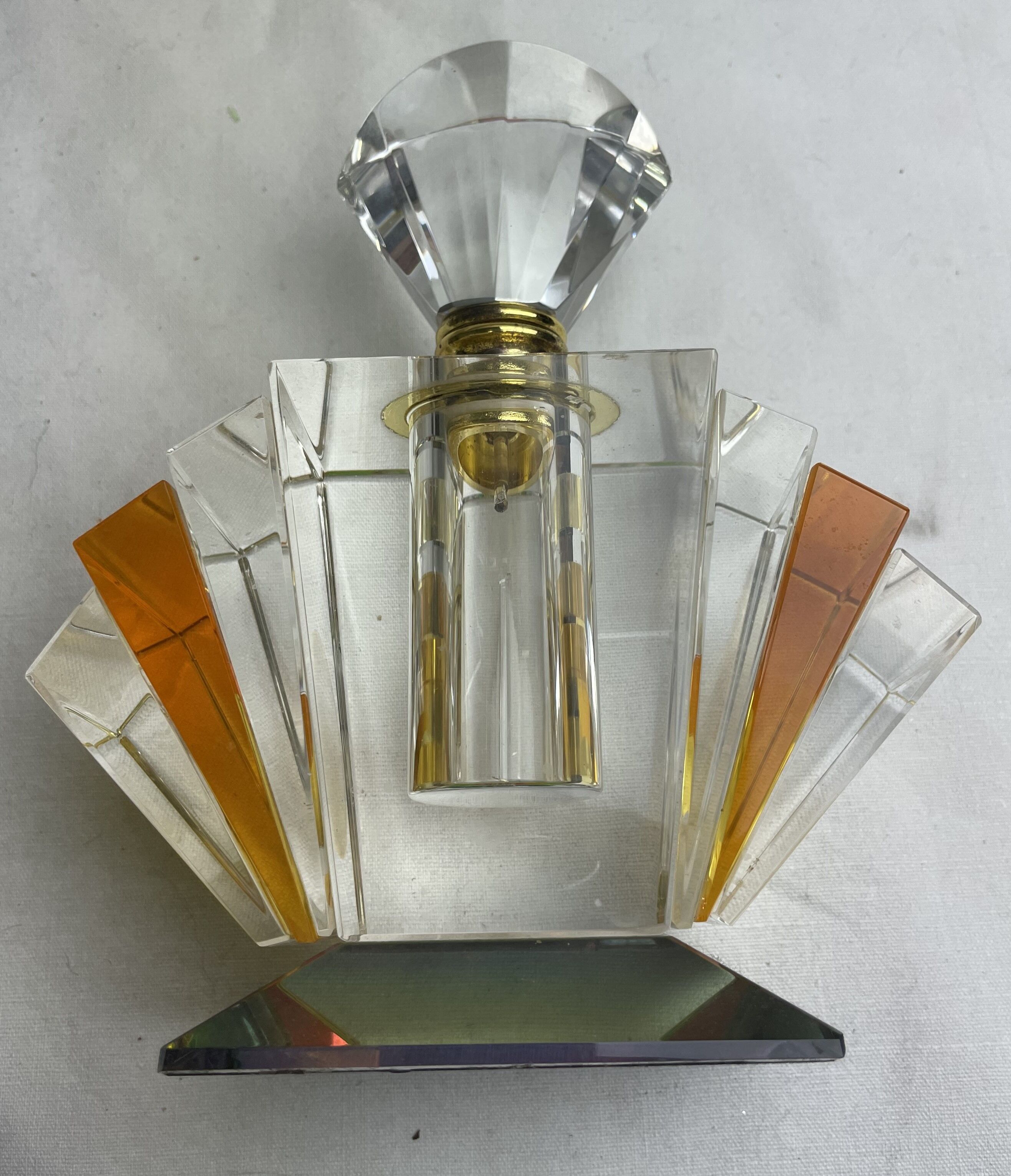 Empty art deco perfume bottle in amber crystal