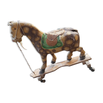 Old boiled cardboard horse toy
