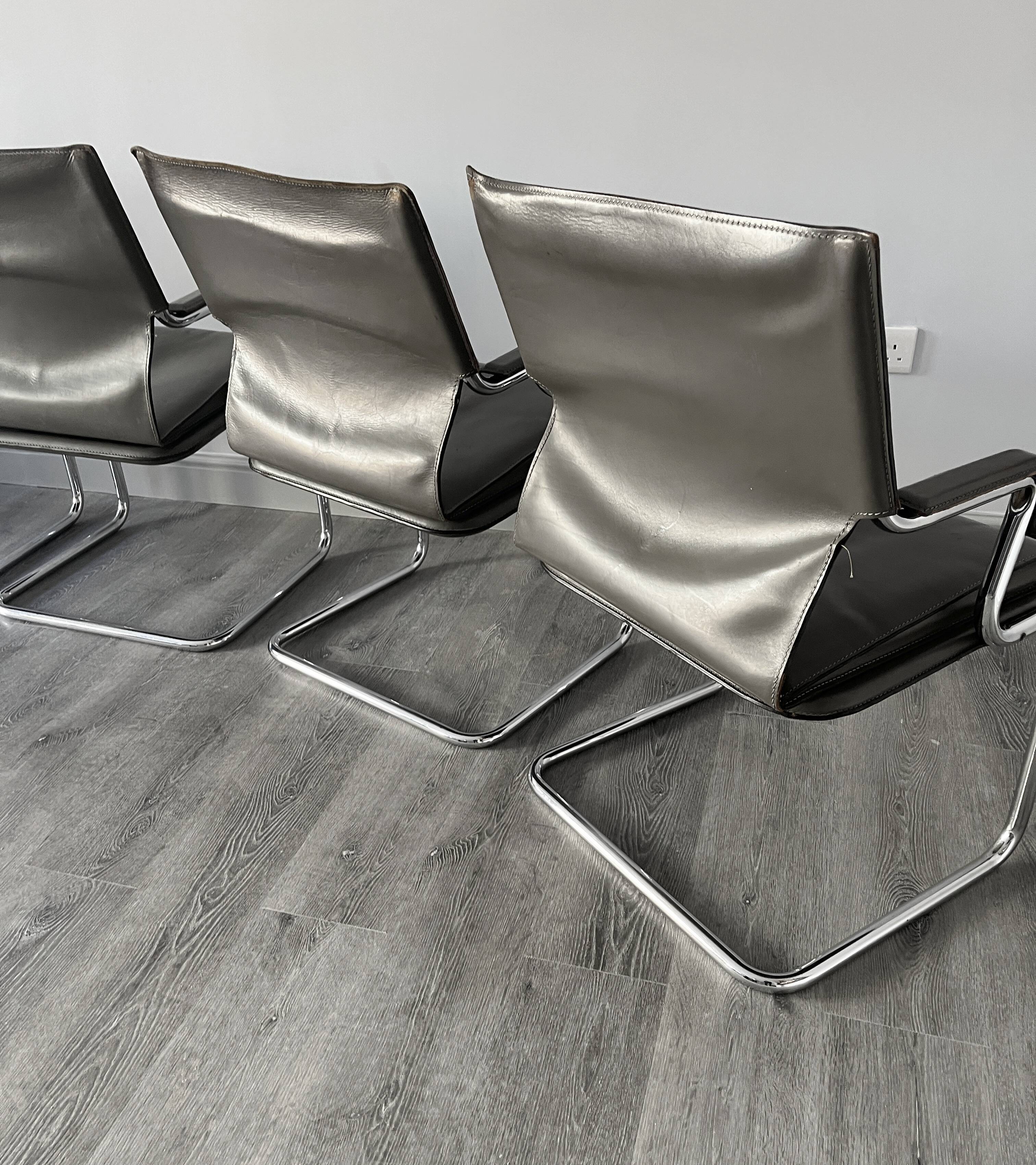 Set of 6 Uno chairs in grey leather on tubular chrome cantilevered frames