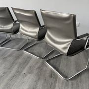 Set of 6 Uno chairs in grey leather on tubular chrome cantilevered frames