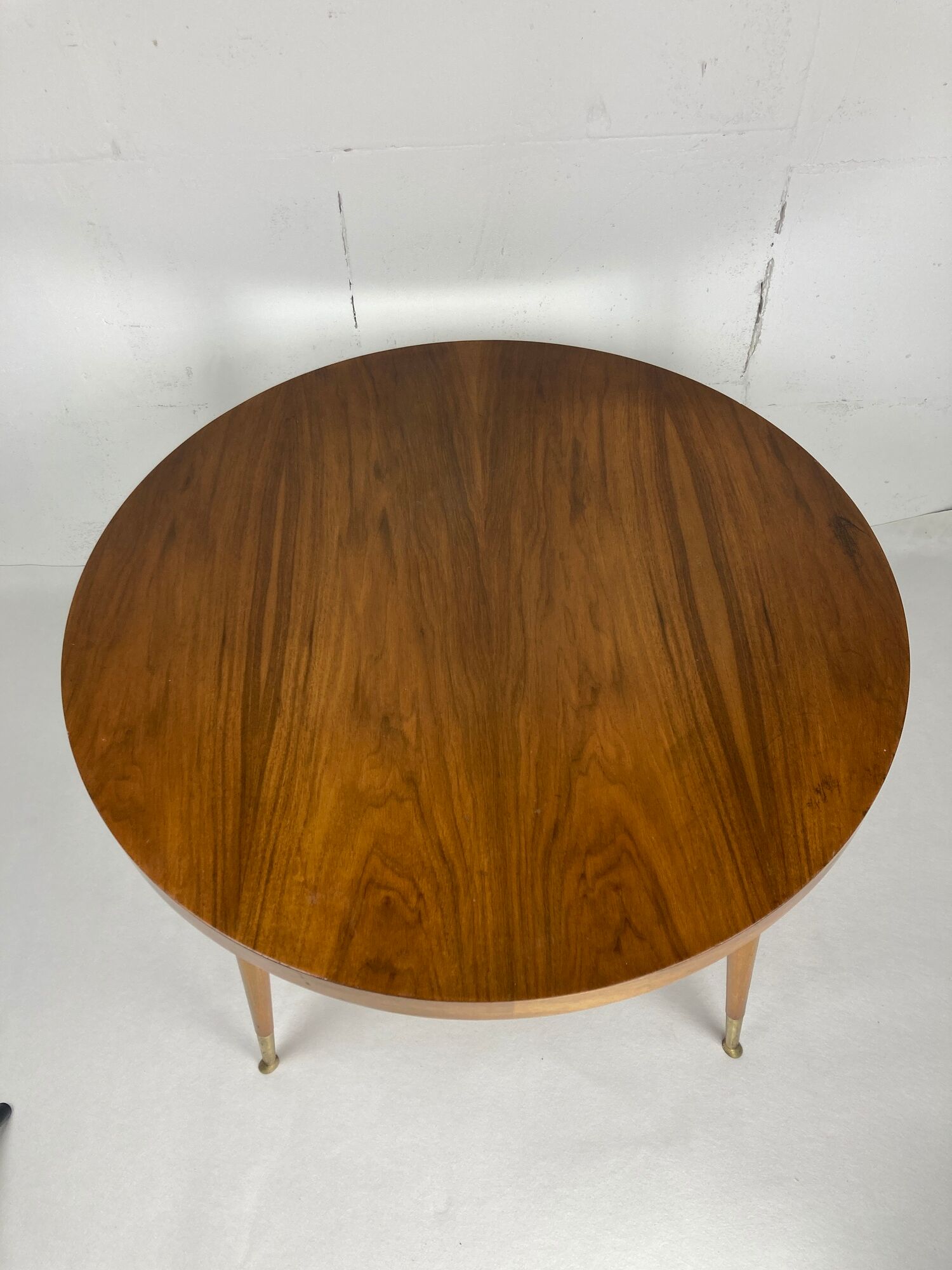 Italian round table with tapered brass leg ends, 1950s