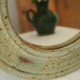 Artisanal round mirror in vintage green sandstone signed