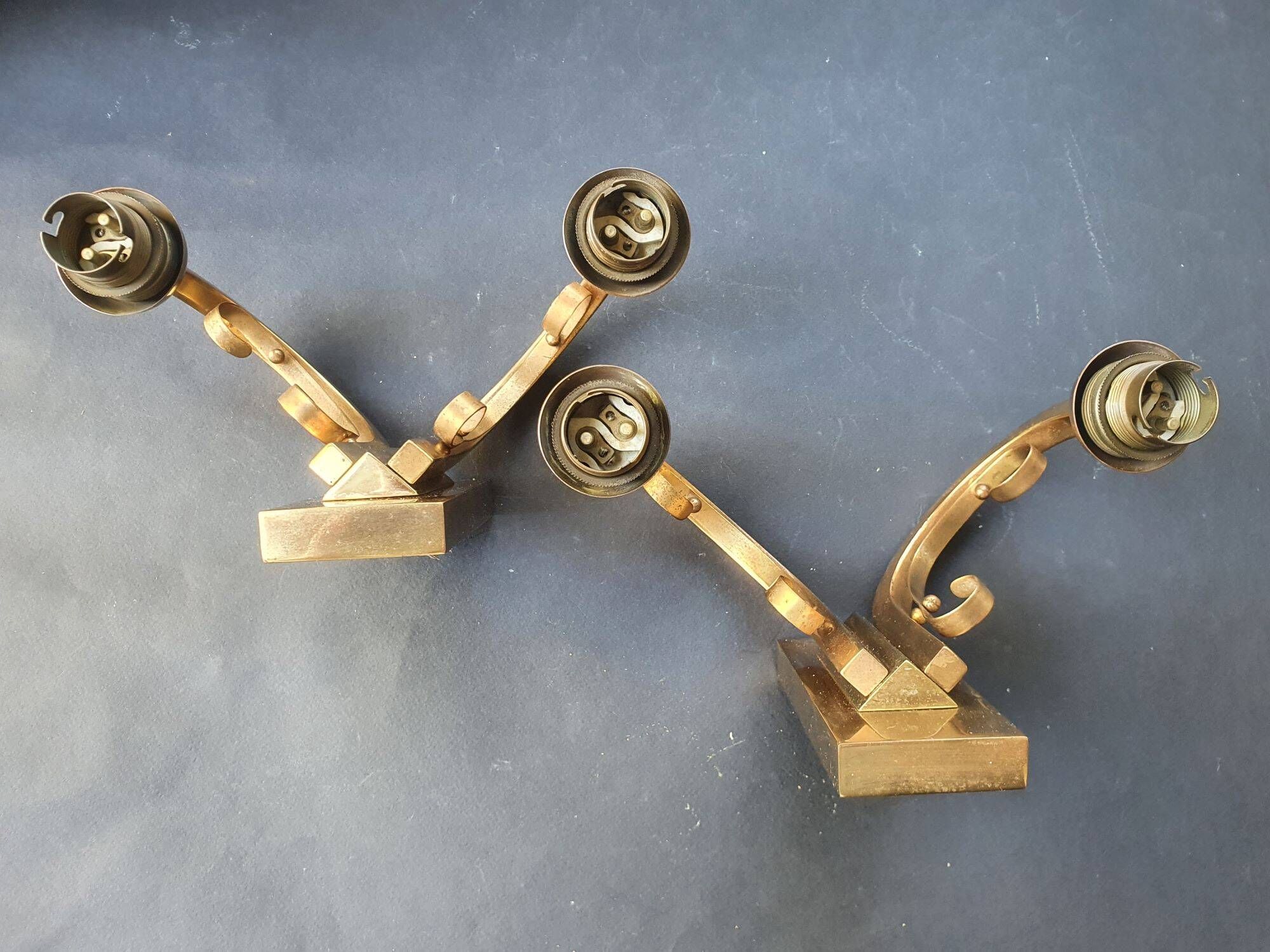 Pair of bronze wall sconces with 1940s Art Deco lampshades.