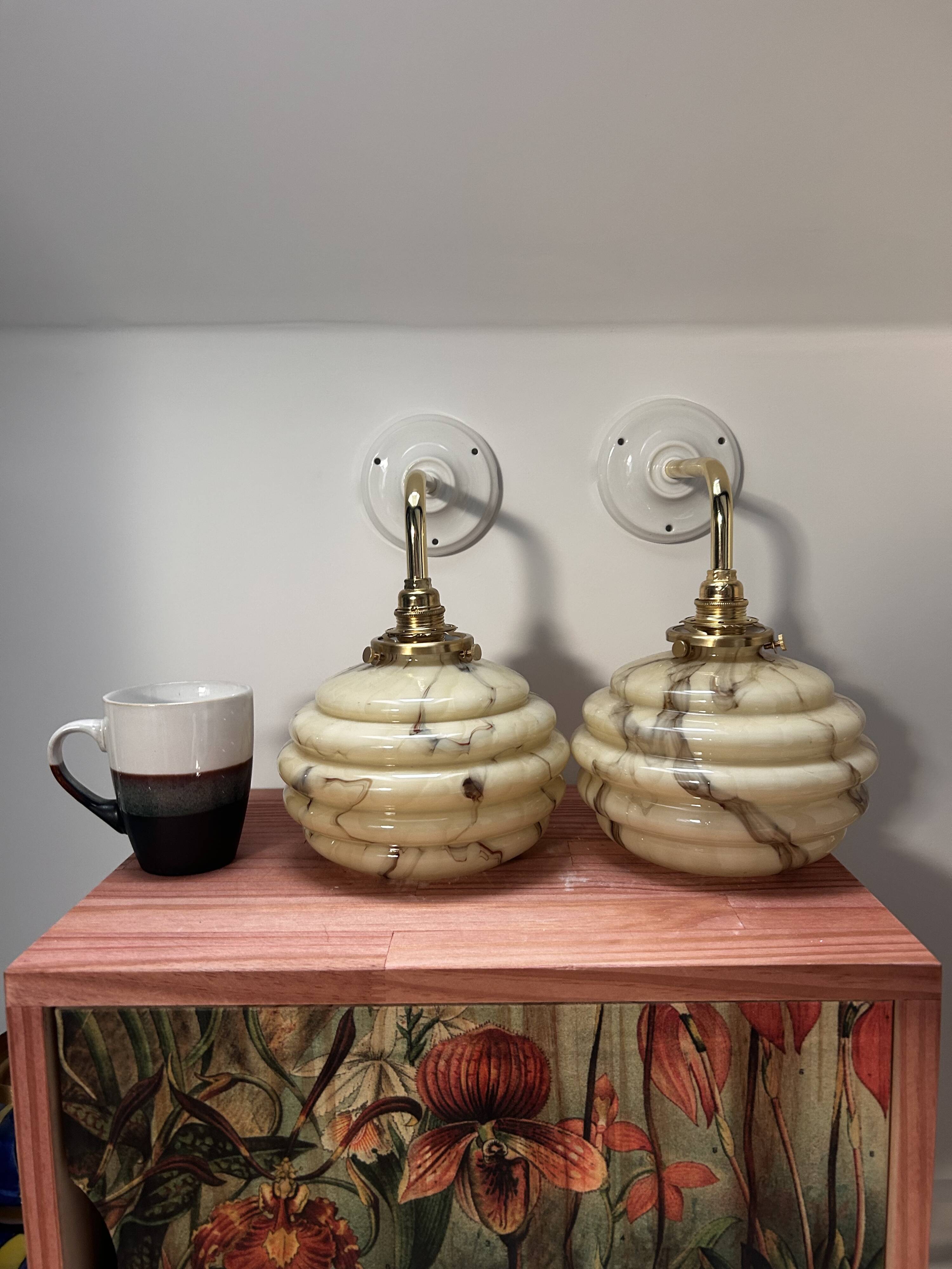 Pair of vintage marbled opaline globe wall lights