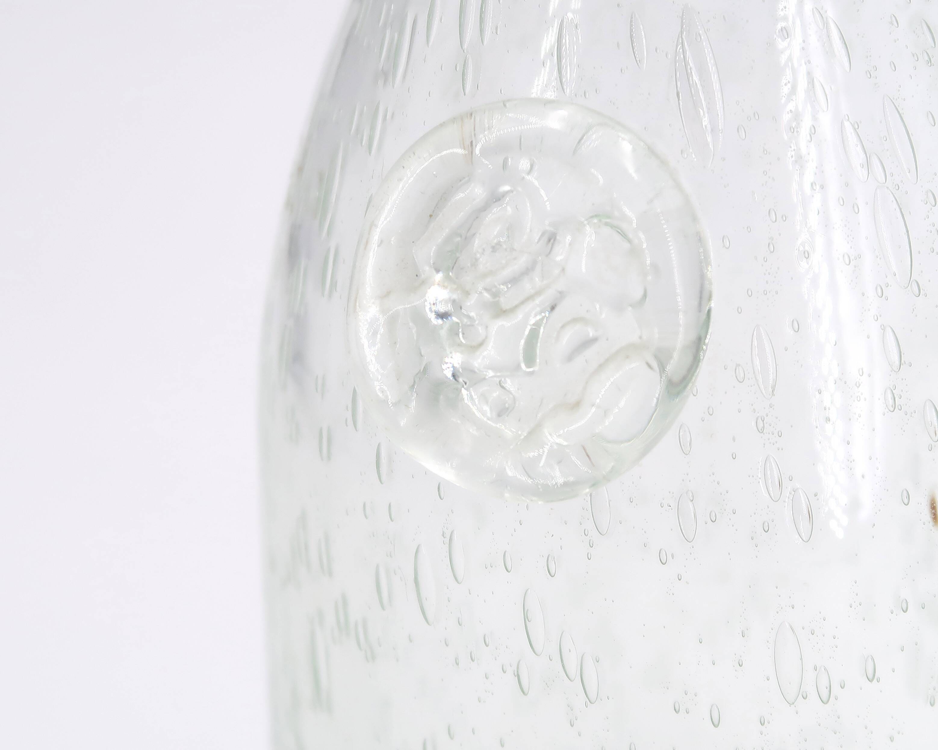Clear bubbled glass carafe bottle from Biot, 1970s