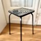 Antique stool in restyled formica