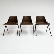 Brown and black set of 6 Polyprop chairs on a metal frame. The Polyprop cha