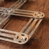Vintage accordion folding metal trivet