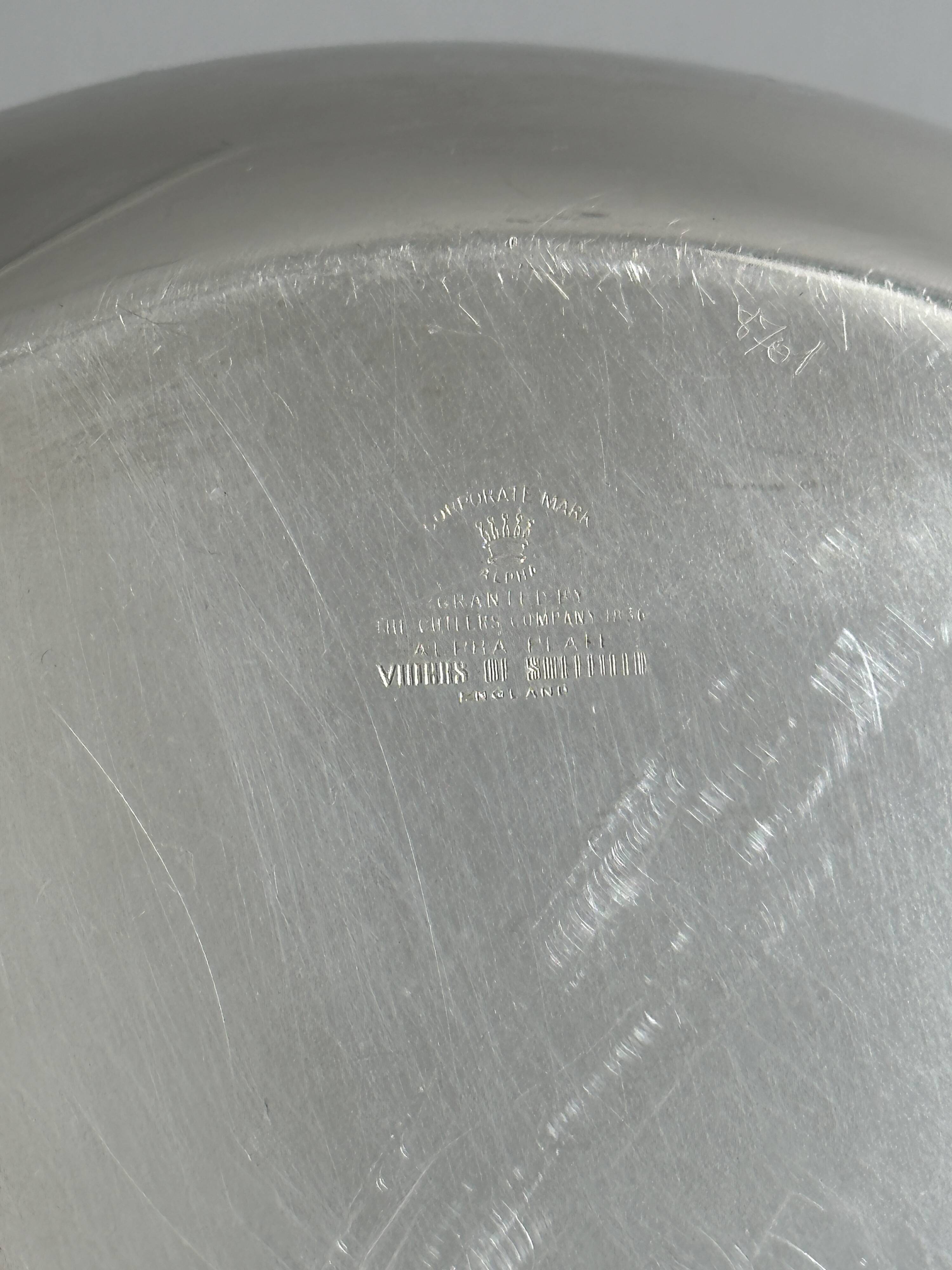 Small shiny silver metal dish