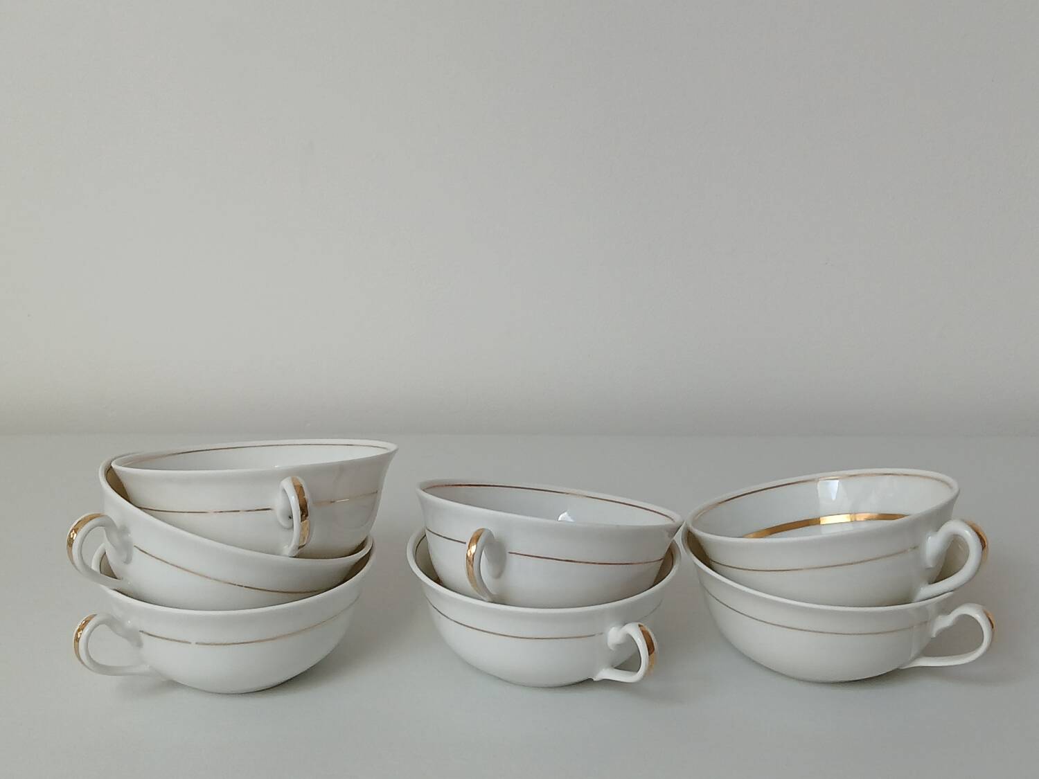 Set of 7 Limoges porcelain cups and saucers