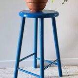Vintage wooden stool with electric blue paint