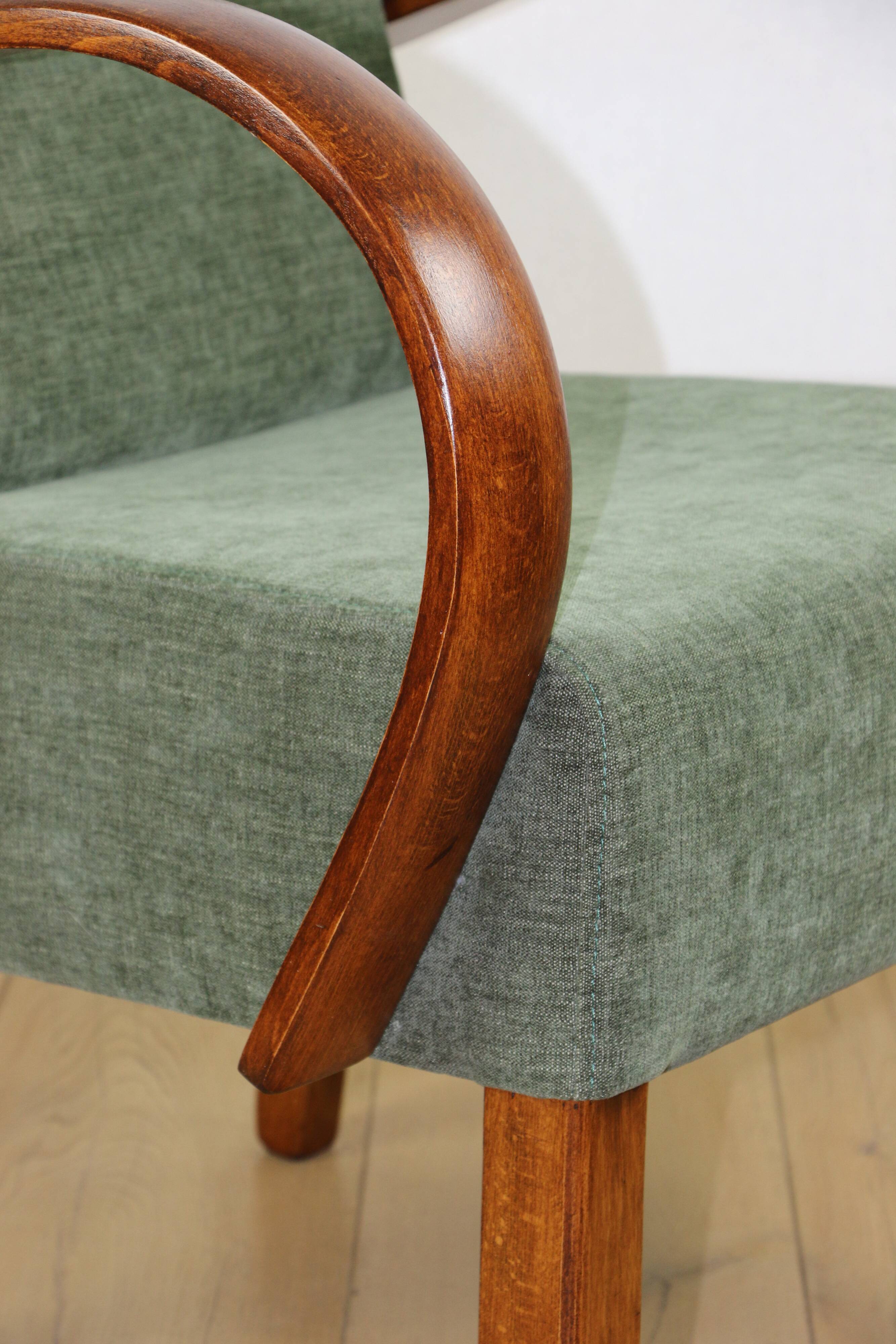 Bent vintage Art Deco loft armchair olive green
