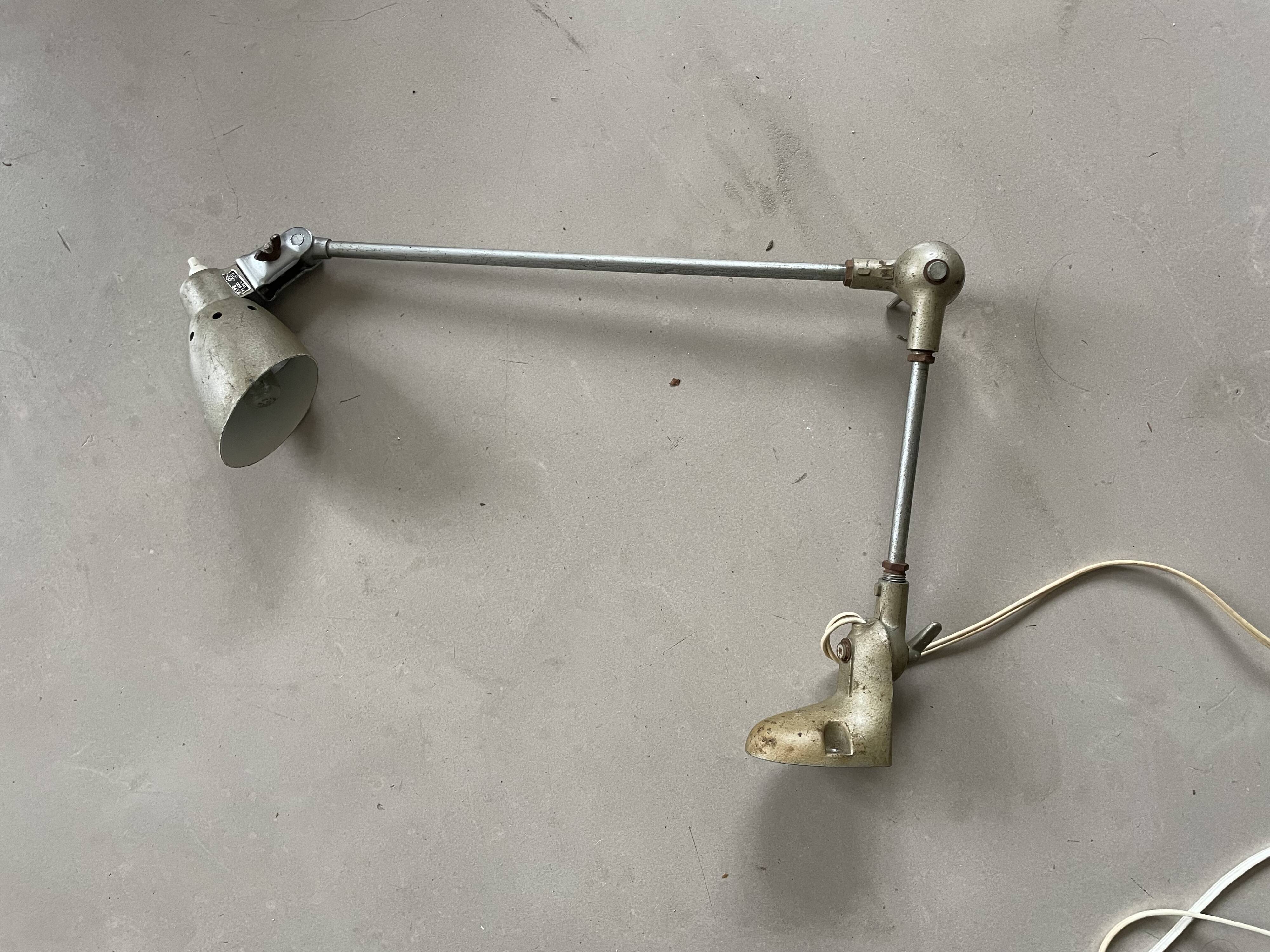 Old industrial articulated lamp
