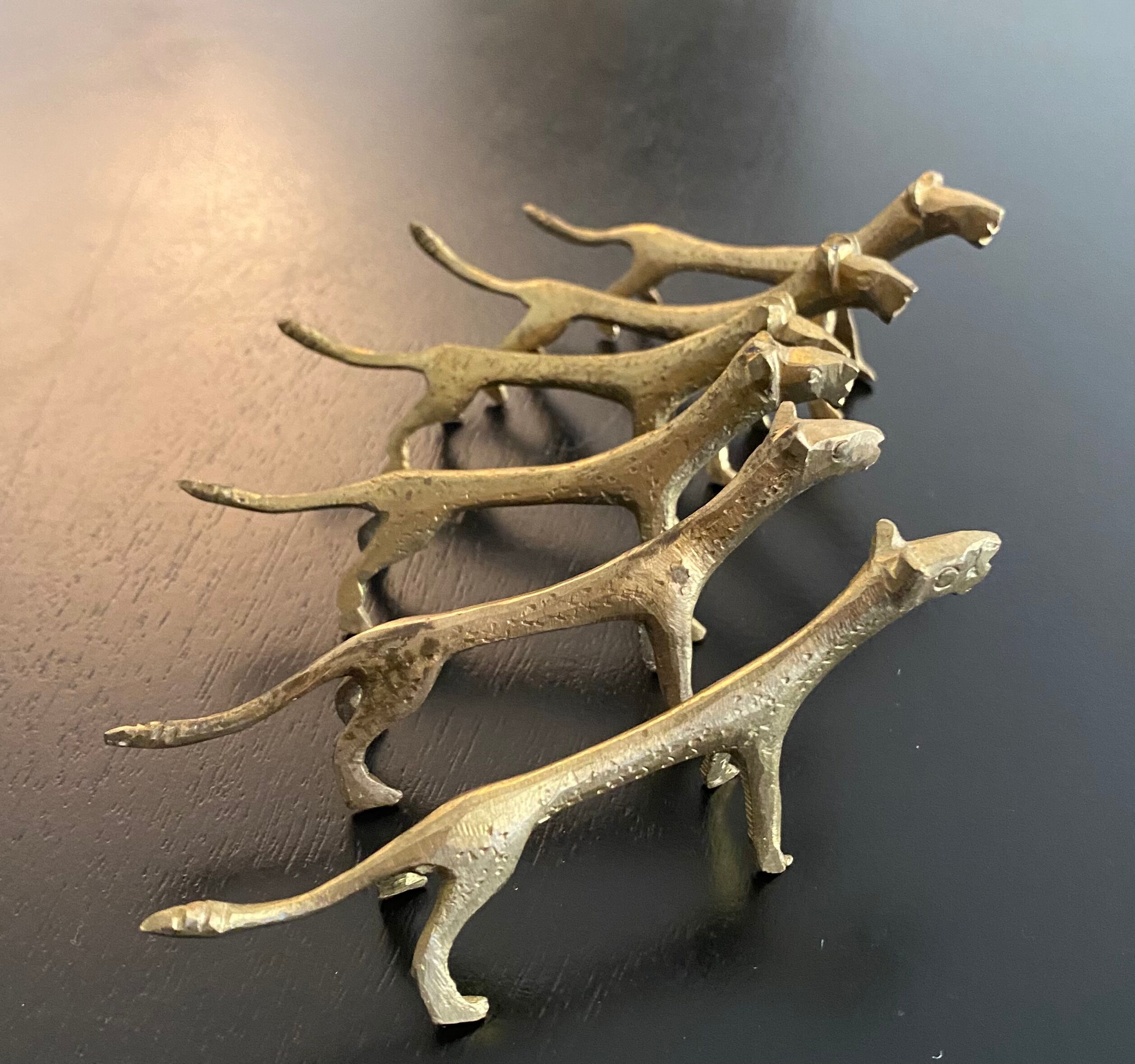 6 lioness-shaped brass knife holders