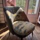 J. Tenreiro, Brazil. Concha armchair with tapered legs, Cluny tapestry 1400.