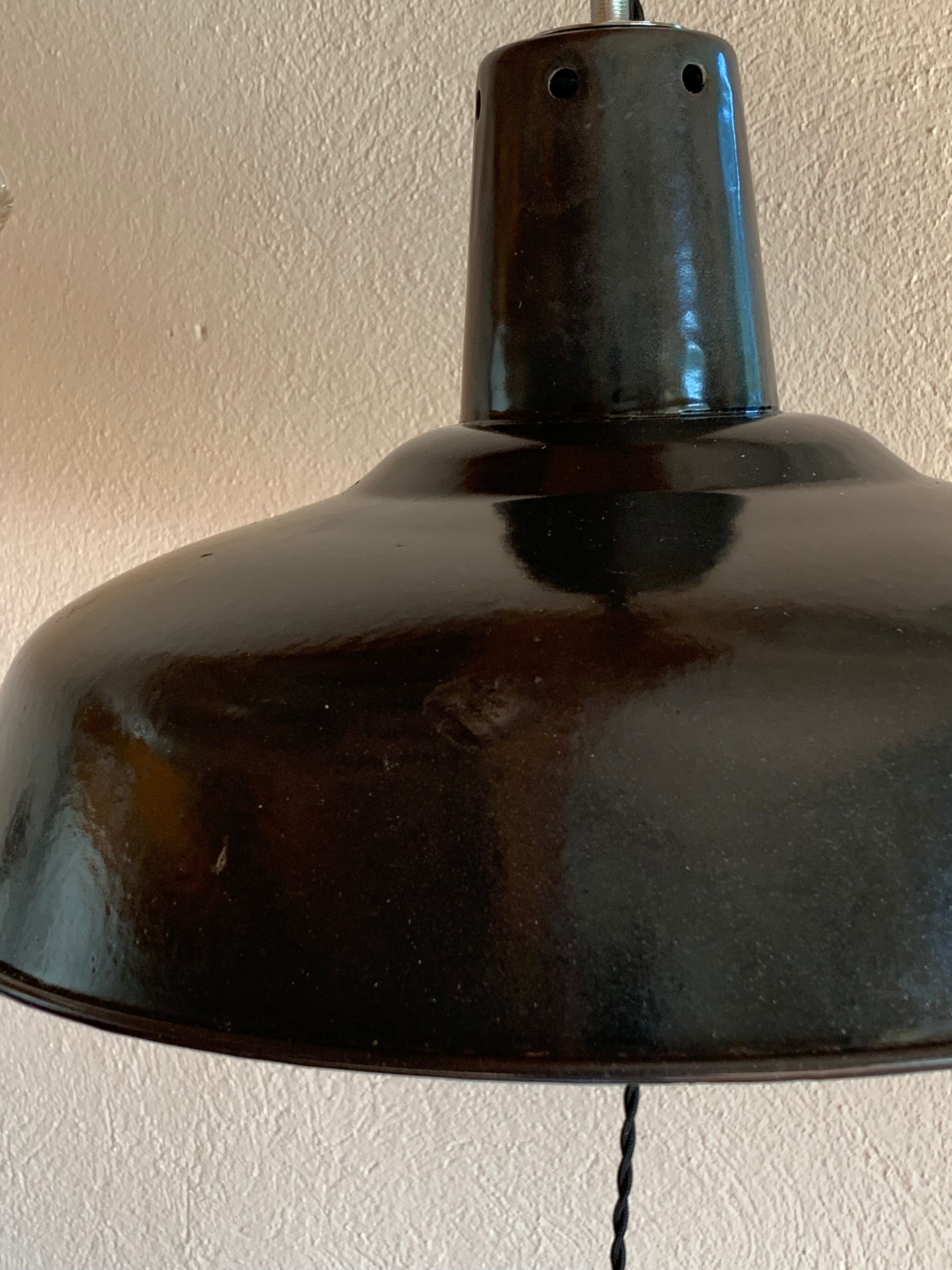 Pair of 40s enamelled XL industrial suspensions