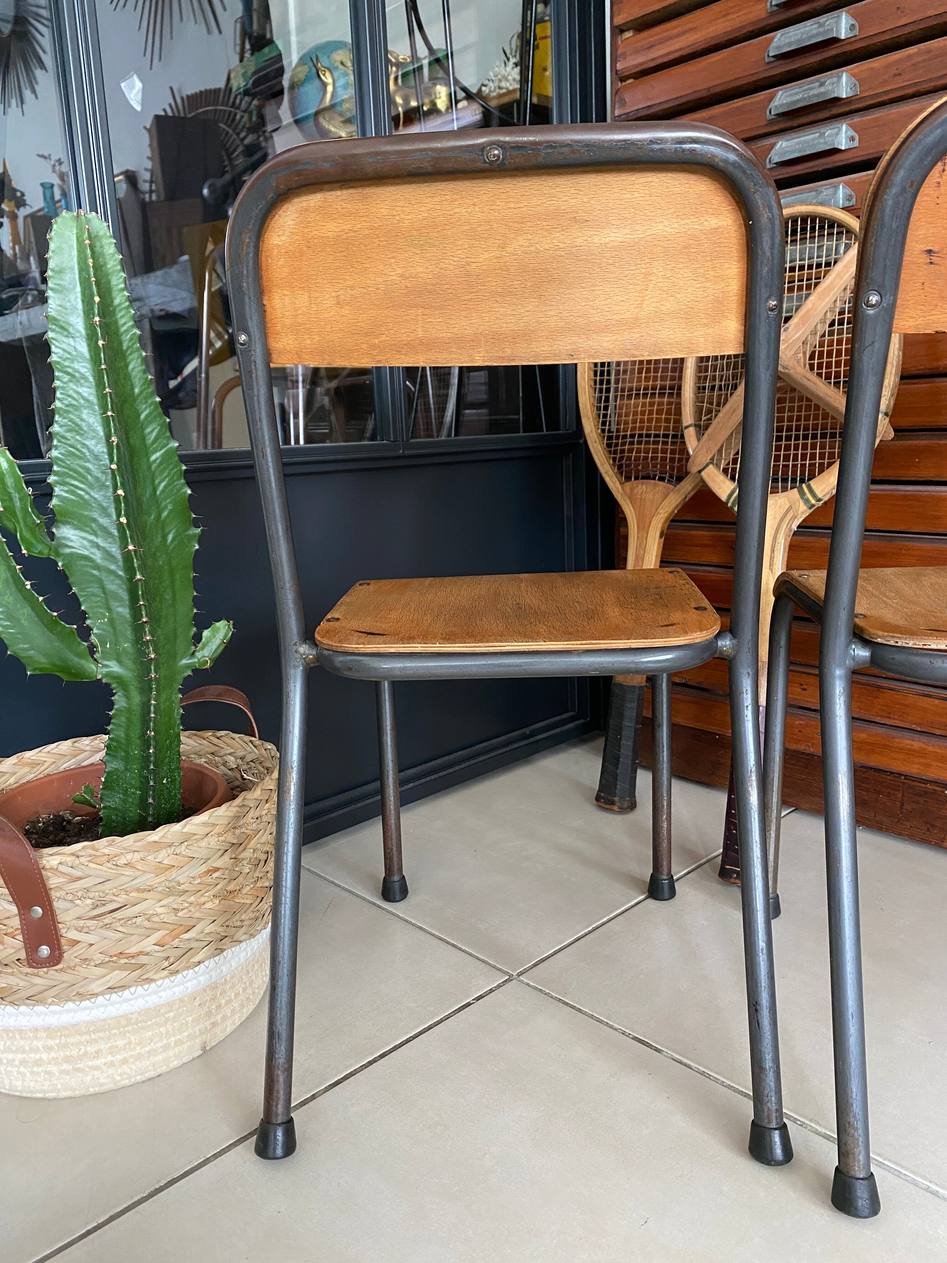 Pair of wooden and metal children's chairs