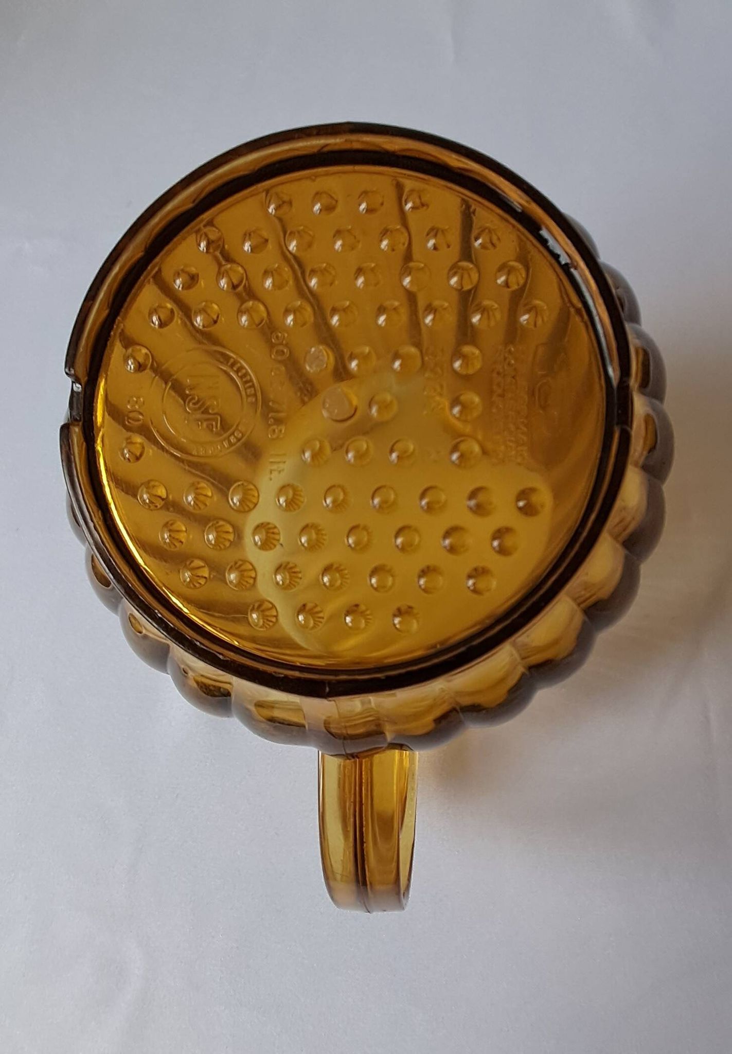 Vintage amber polycarbonate jug