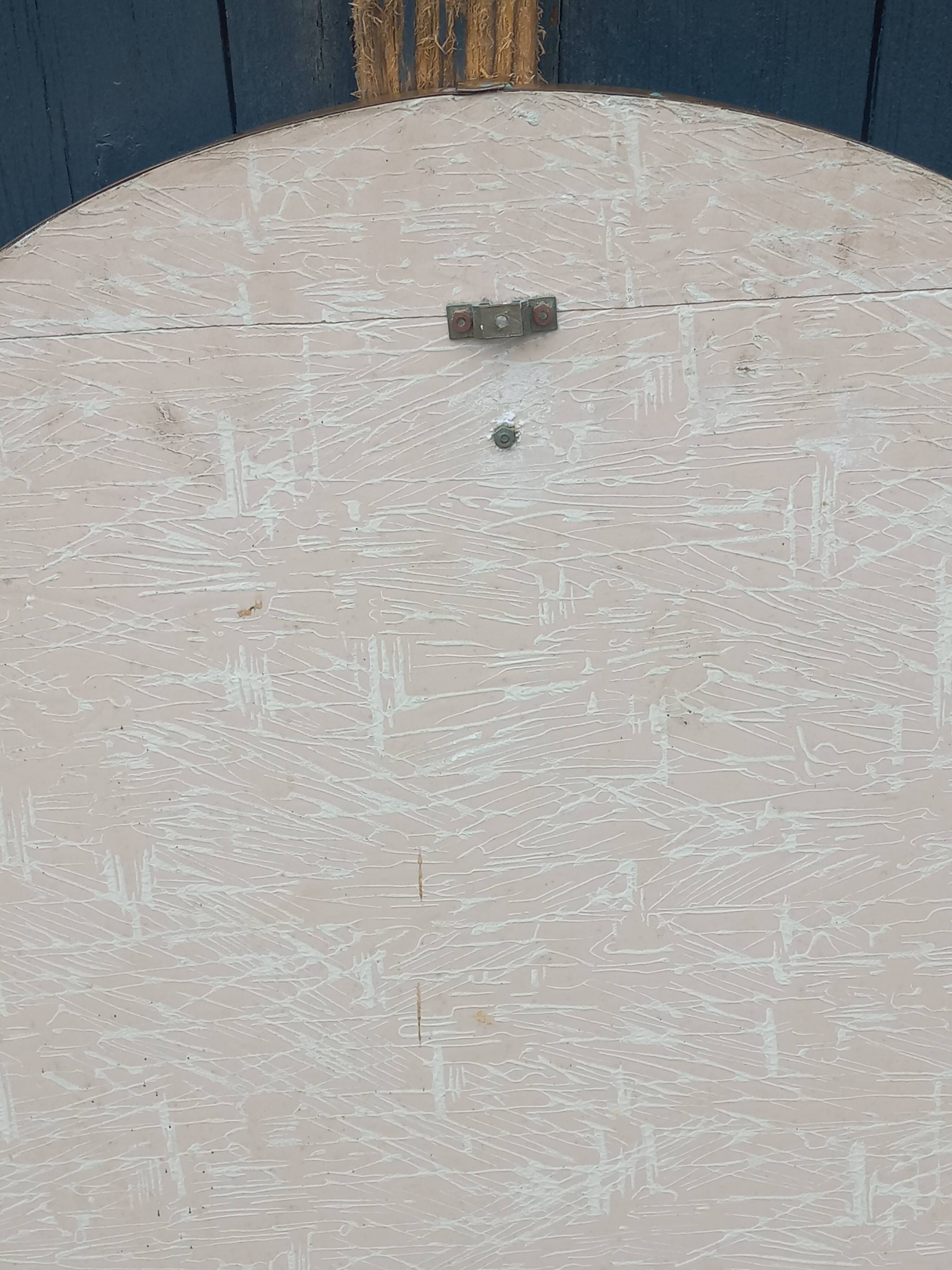 Vintage ceramic mirror from the 1960s.