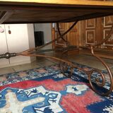 Dining table dining room in old wood panels on wrought iron cradle