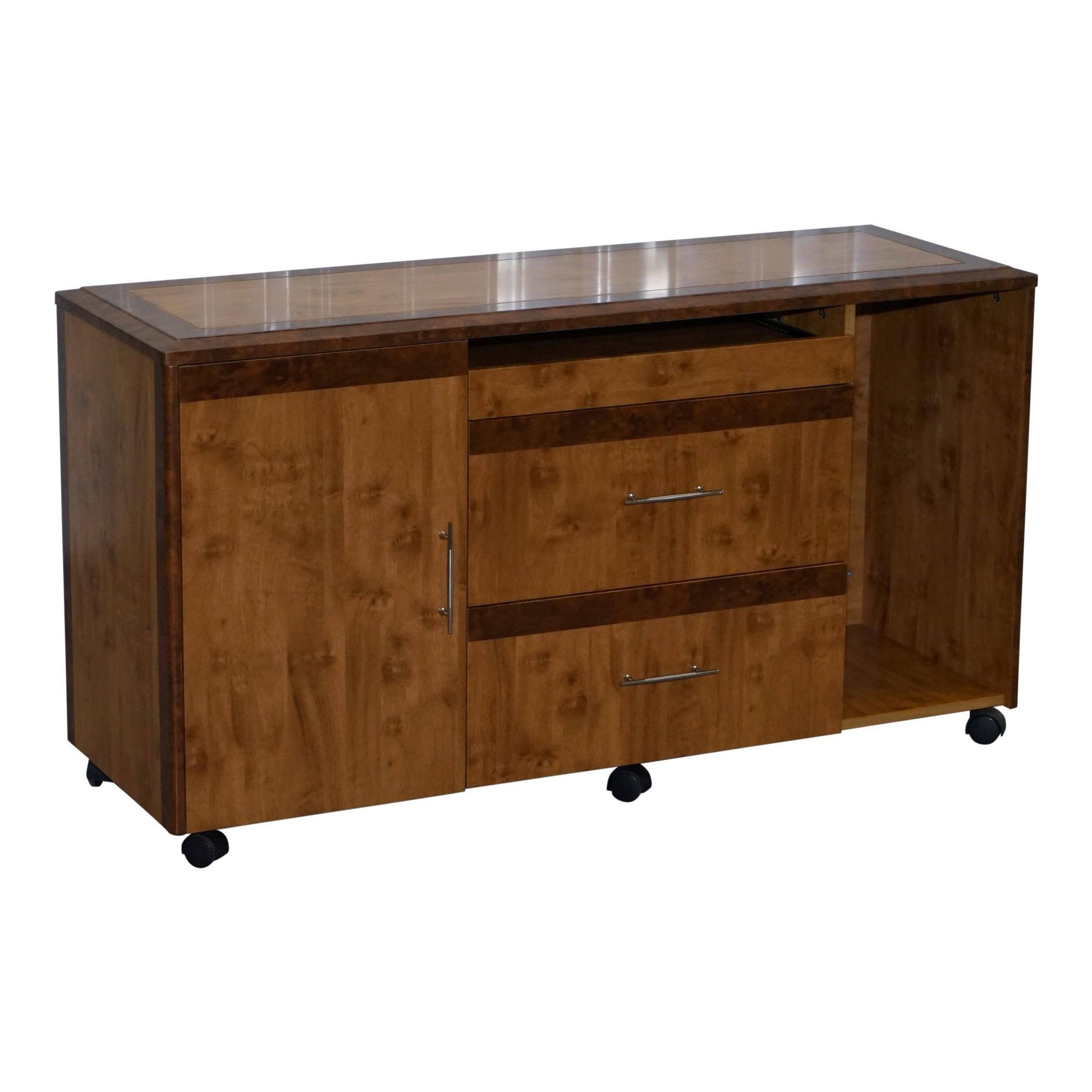 Walnut Burr buffet with drawers and wheels, part of a set.