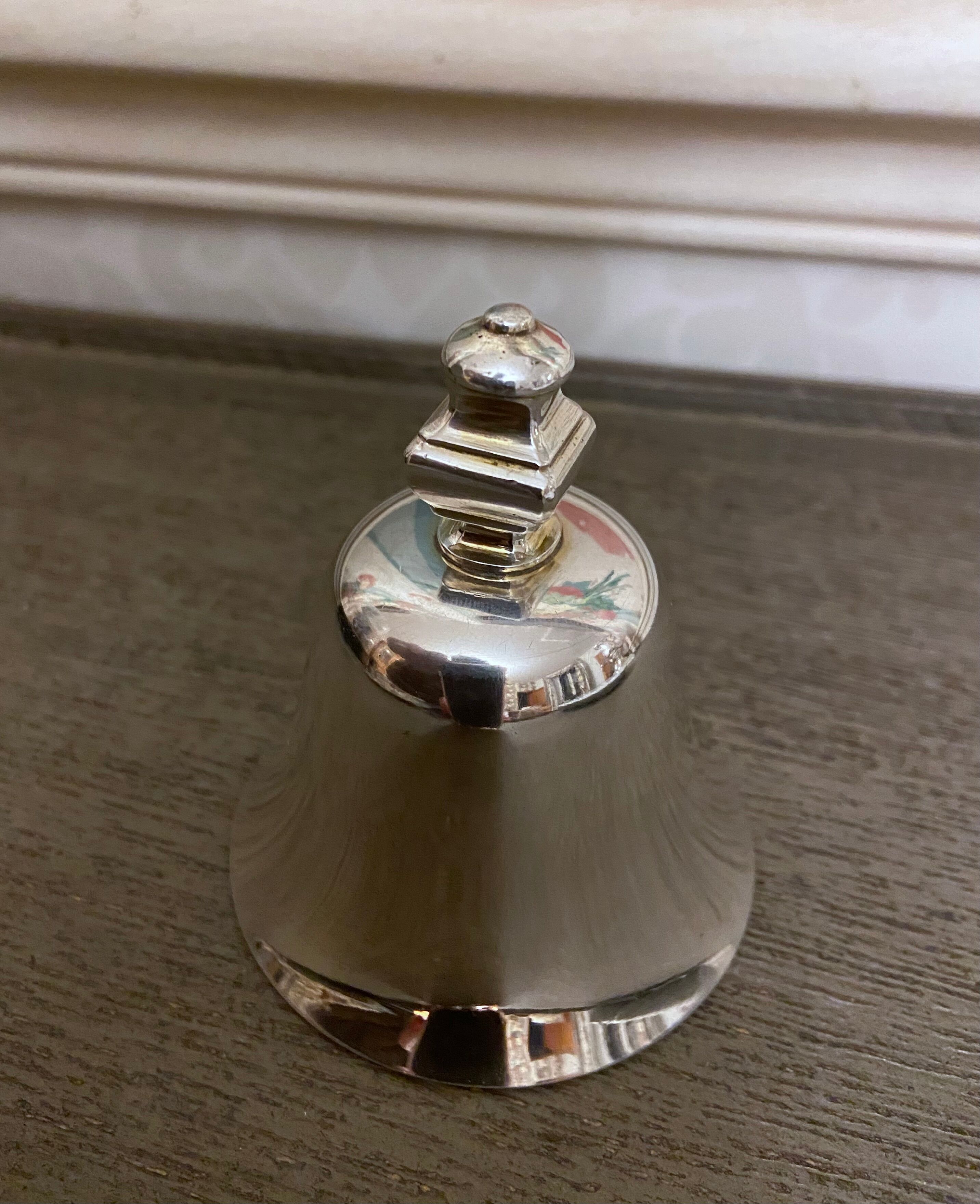 Small bell silver metal