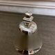 Small bell silver metal