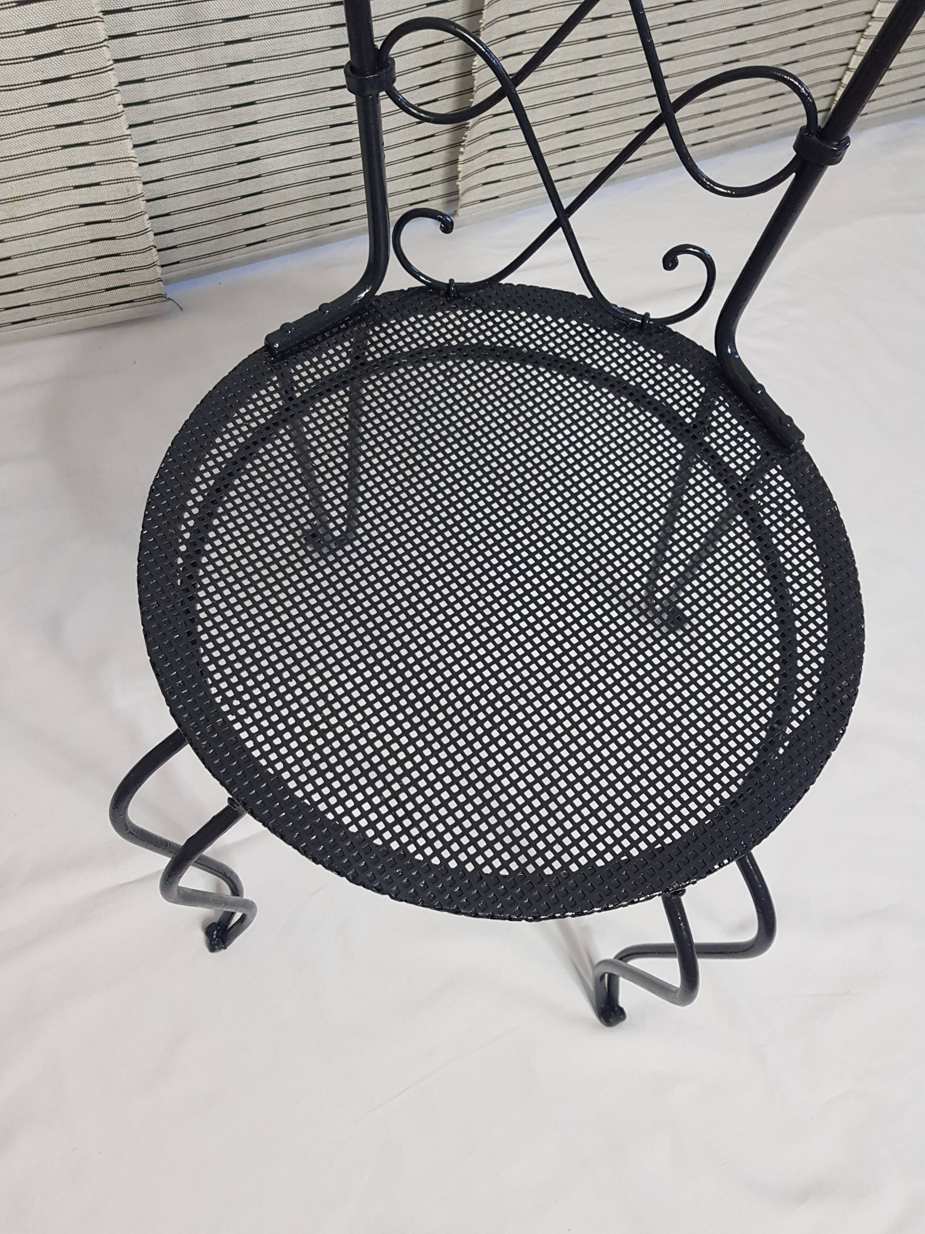 Wrought iron "corset" garden chair