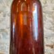 Set of 10 bottles of old Bordeaux French wine in ruby brown glass, 19th century.