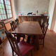 Table en chêne massif avec 2 rallonges intégrées et 7 chaises
