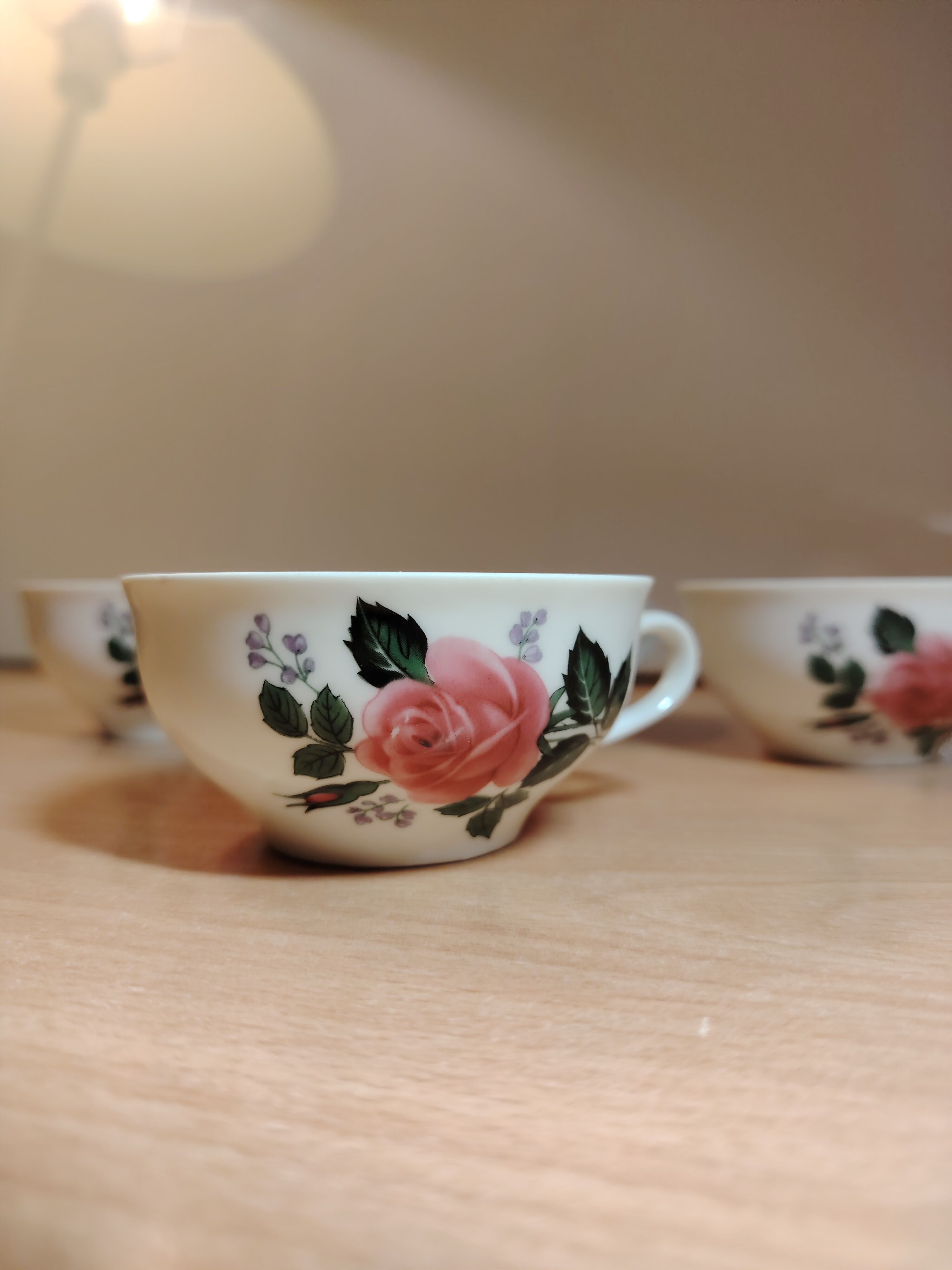 4 vintage cups with a rose pattern
