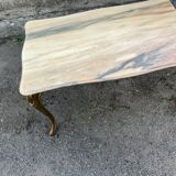 Table basse en laiton doré avec plateau en onyx