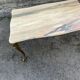Gilded brass coffee table with onyx top