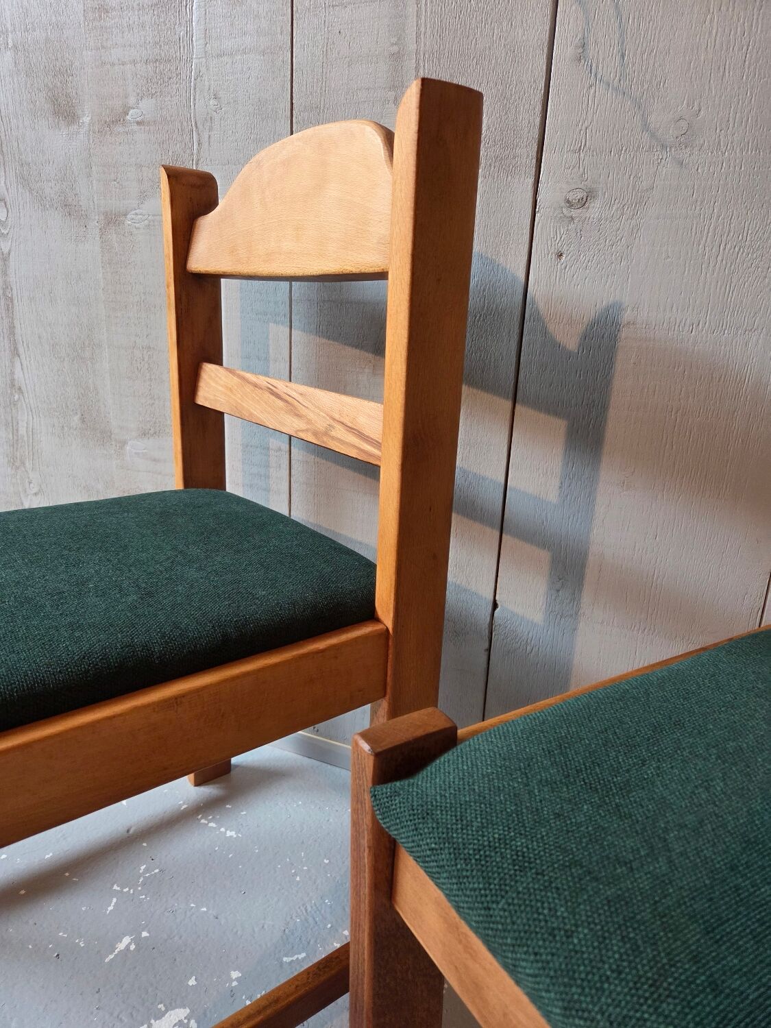 4 green tweed chairs