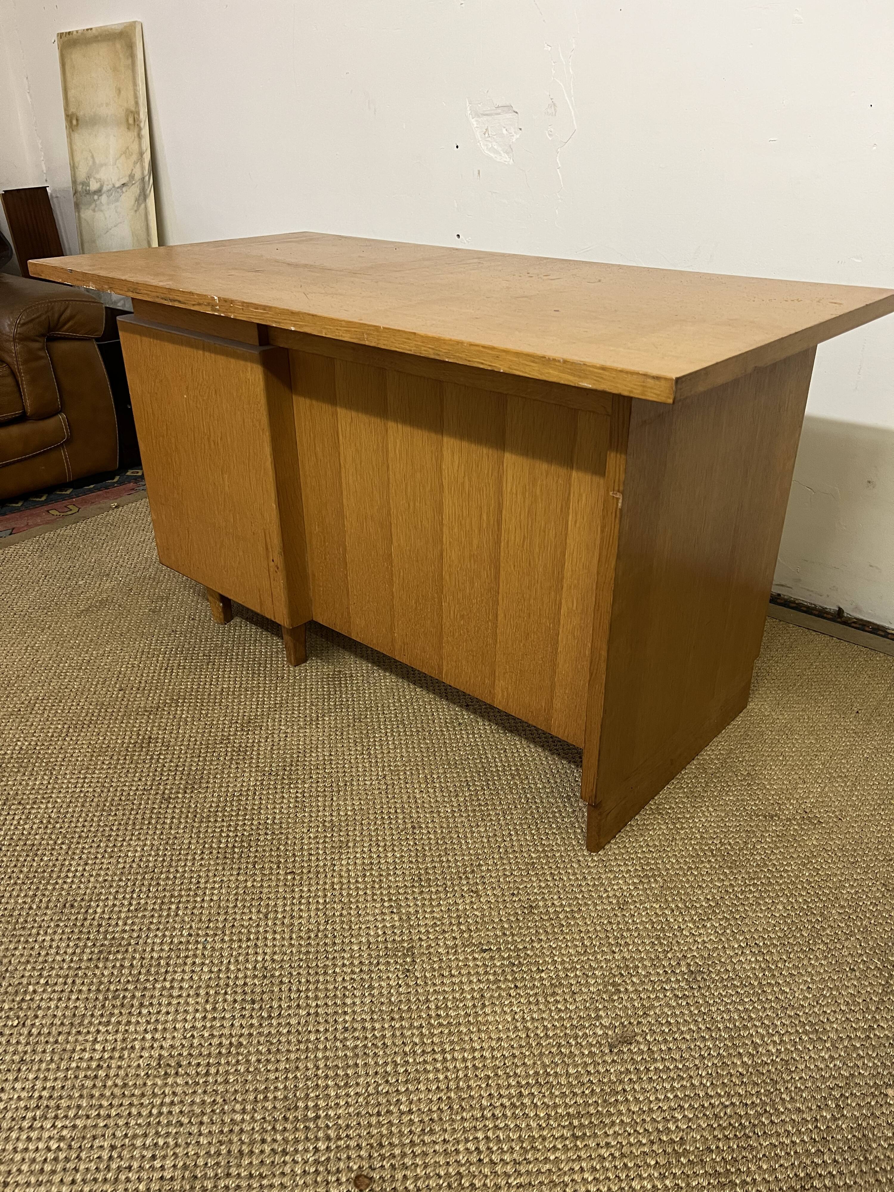 Old wooden desk and armchair