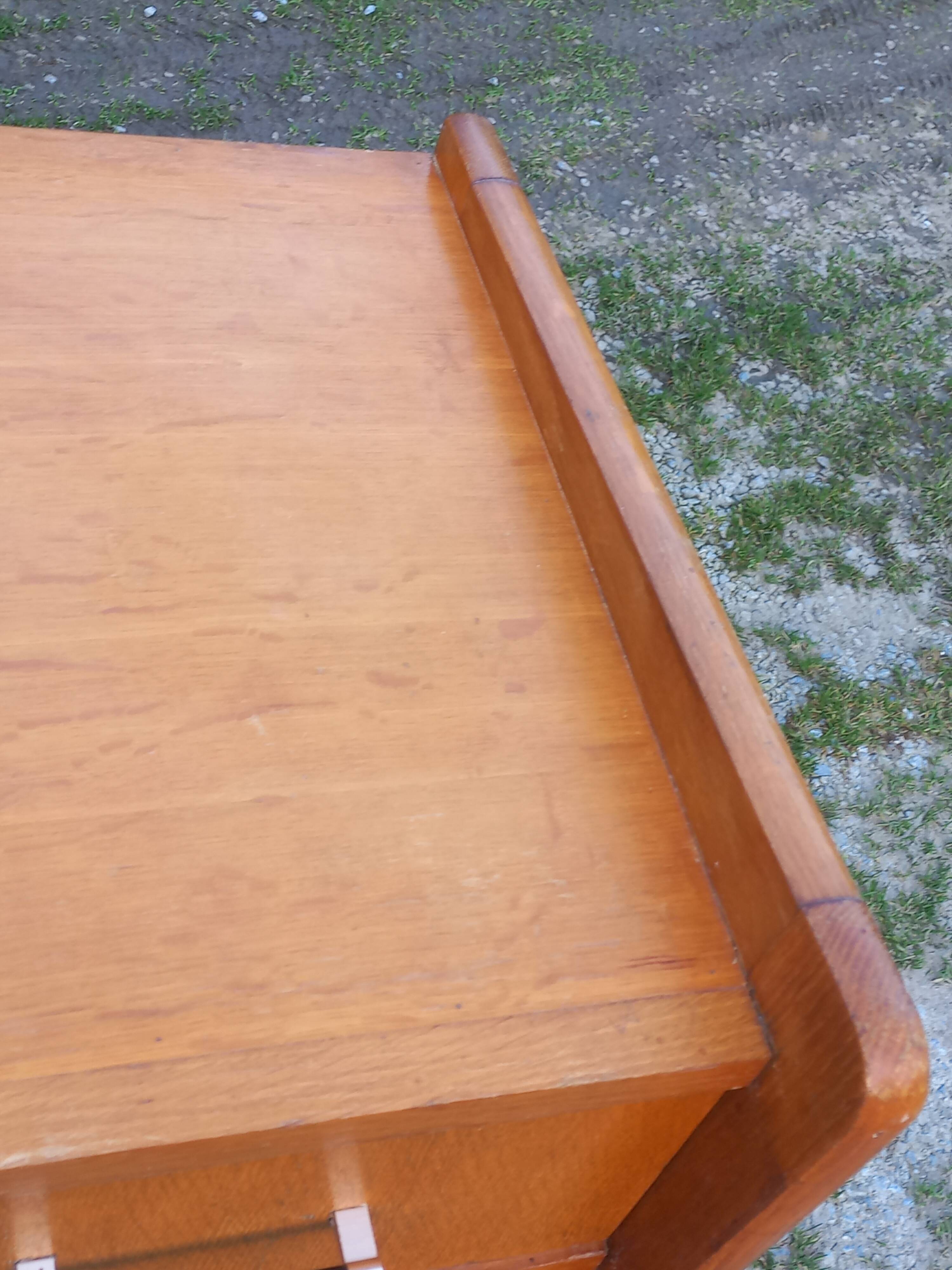 Vintage oak commode with tapered legs and wings from the 1950s.