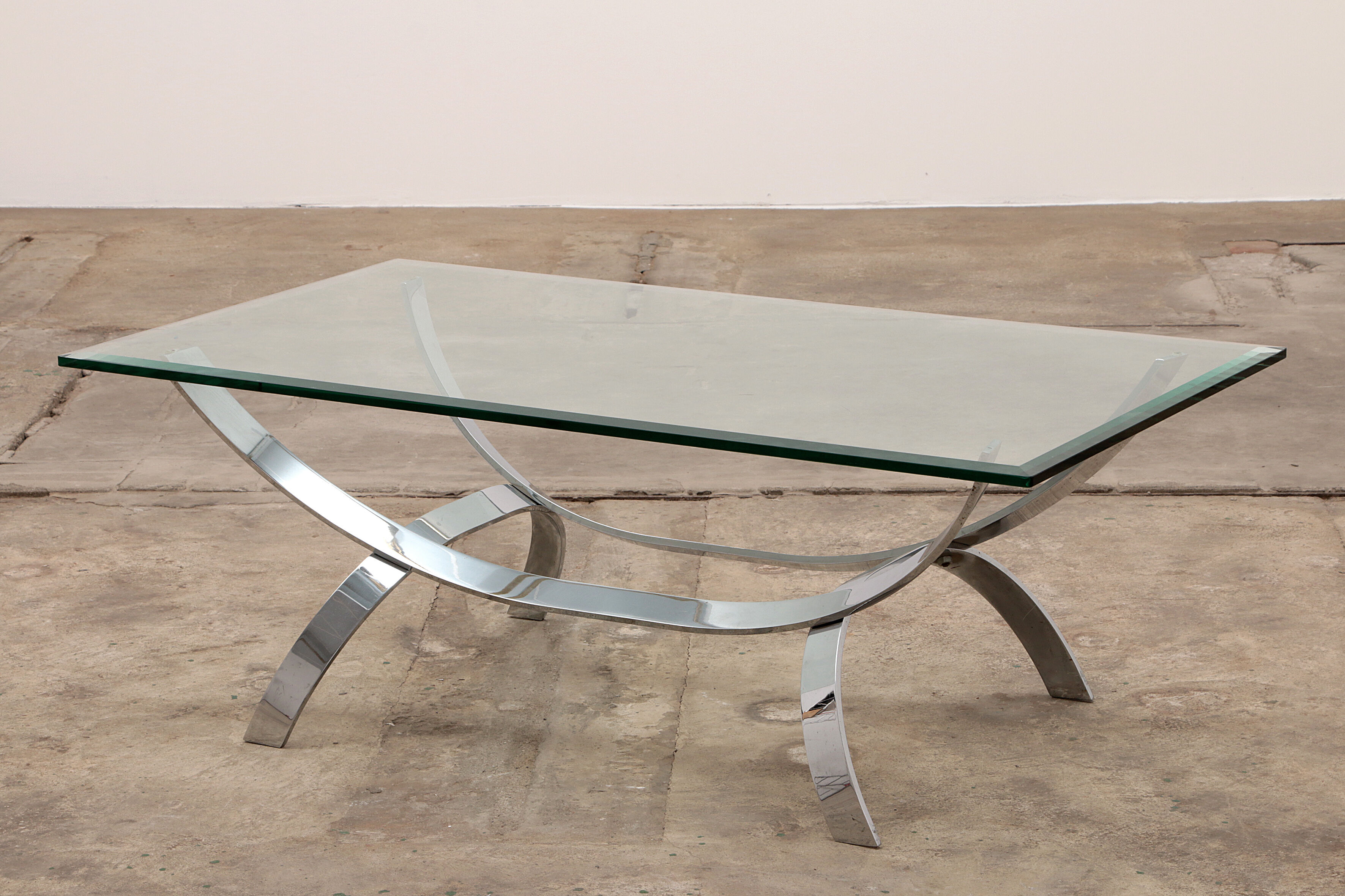 Space age chrome coffee table with thick glass top 1970