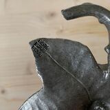 Tin flower candle holder