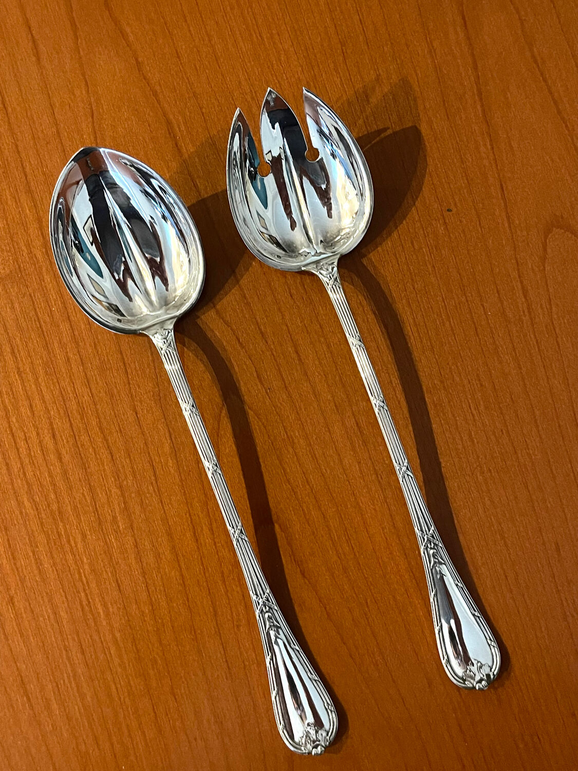 Christofle ribbon and bell-shaped salad serving pieces, very beautiful and