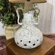 1970s lamp in white ceramic with its period shade.