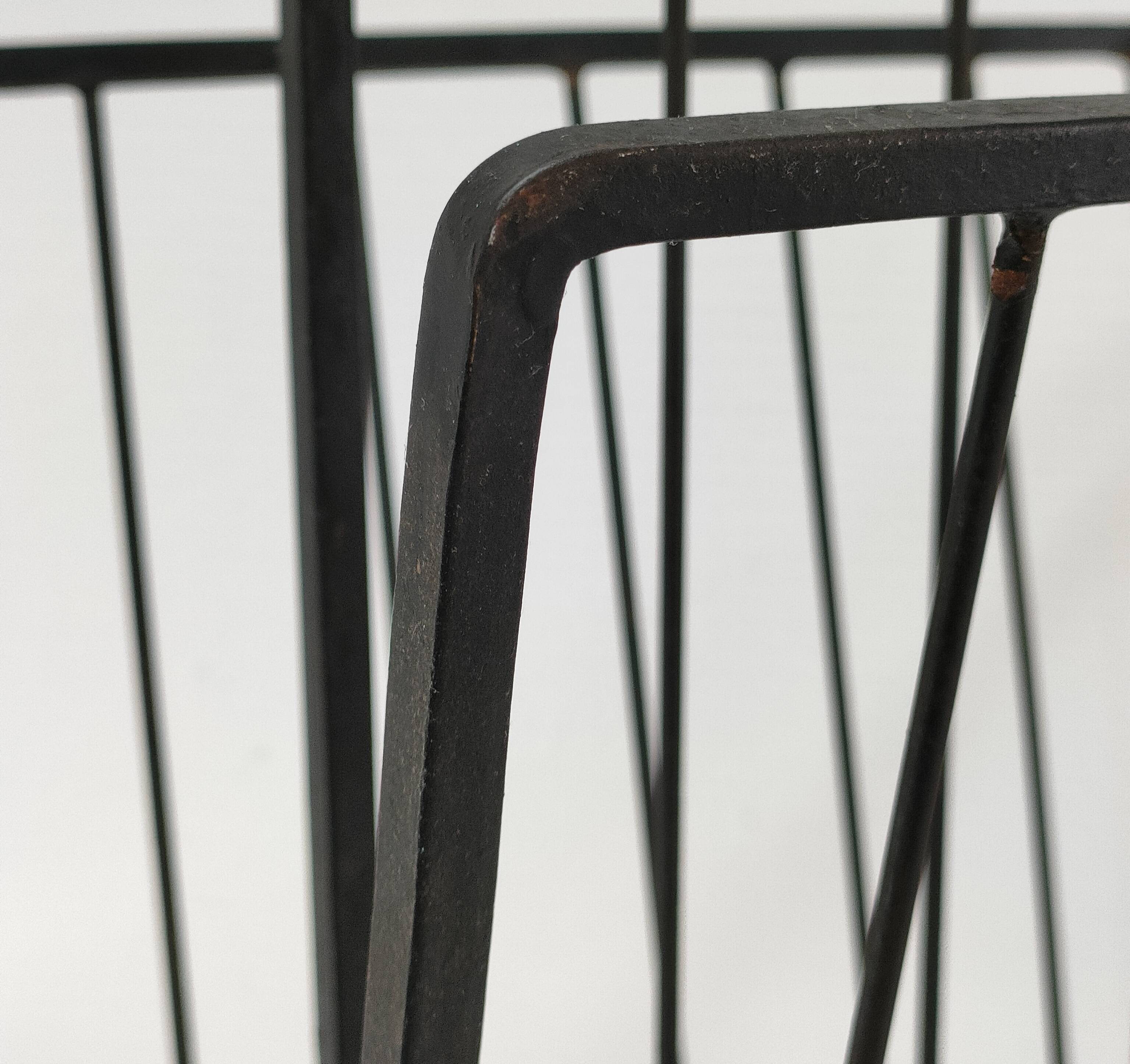 Modernist magazine holder black iron 60s