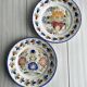2 decorative plates in Quimper earthenware, signed HB Henriot.