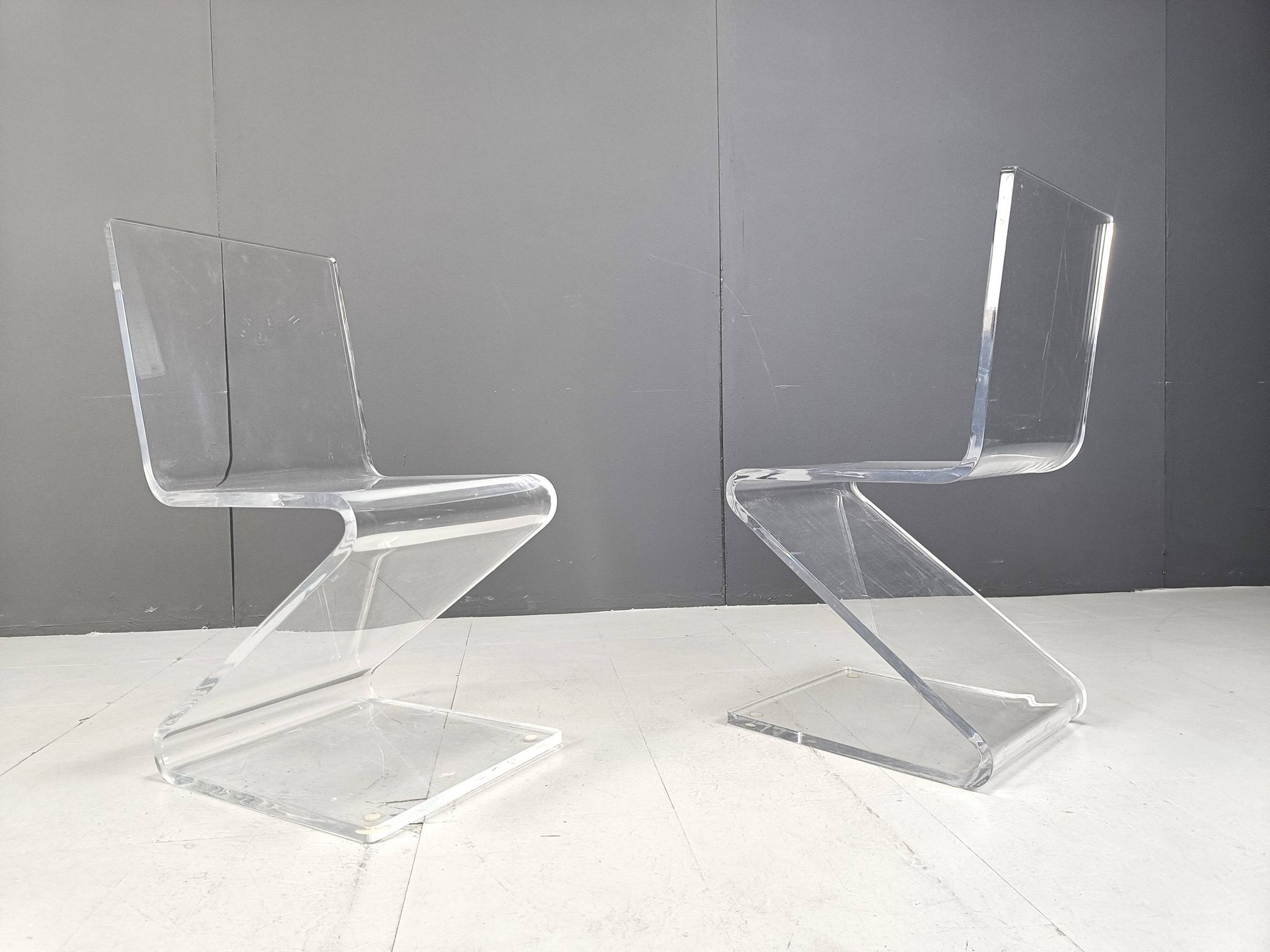 Pair of lucite zigzag dining chairs, 1980s