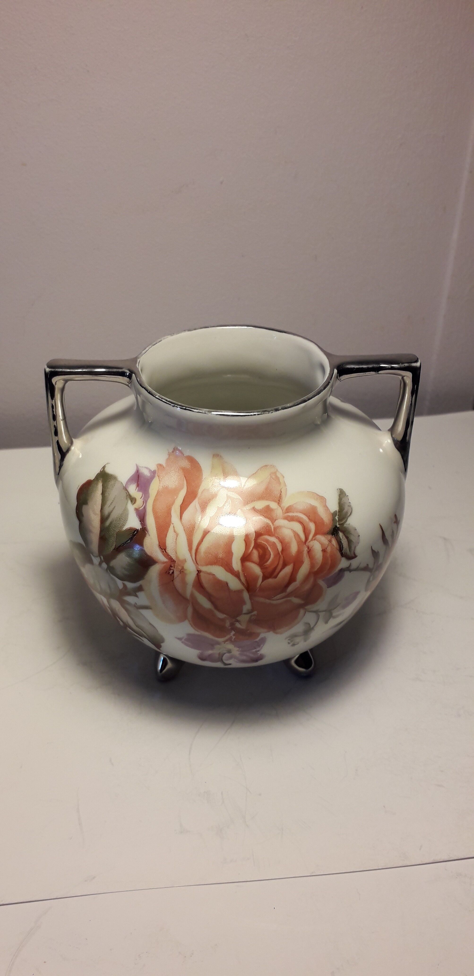 Small old vase with handles in Limoges porcelain.