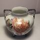 Small old vase with handles in Limoges porcelain.