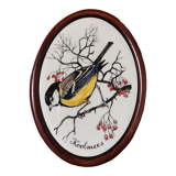 Oval frame bird
