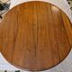 Extendable walnut table, 6 caned chairs in Henri II Neo-Renaissance style.