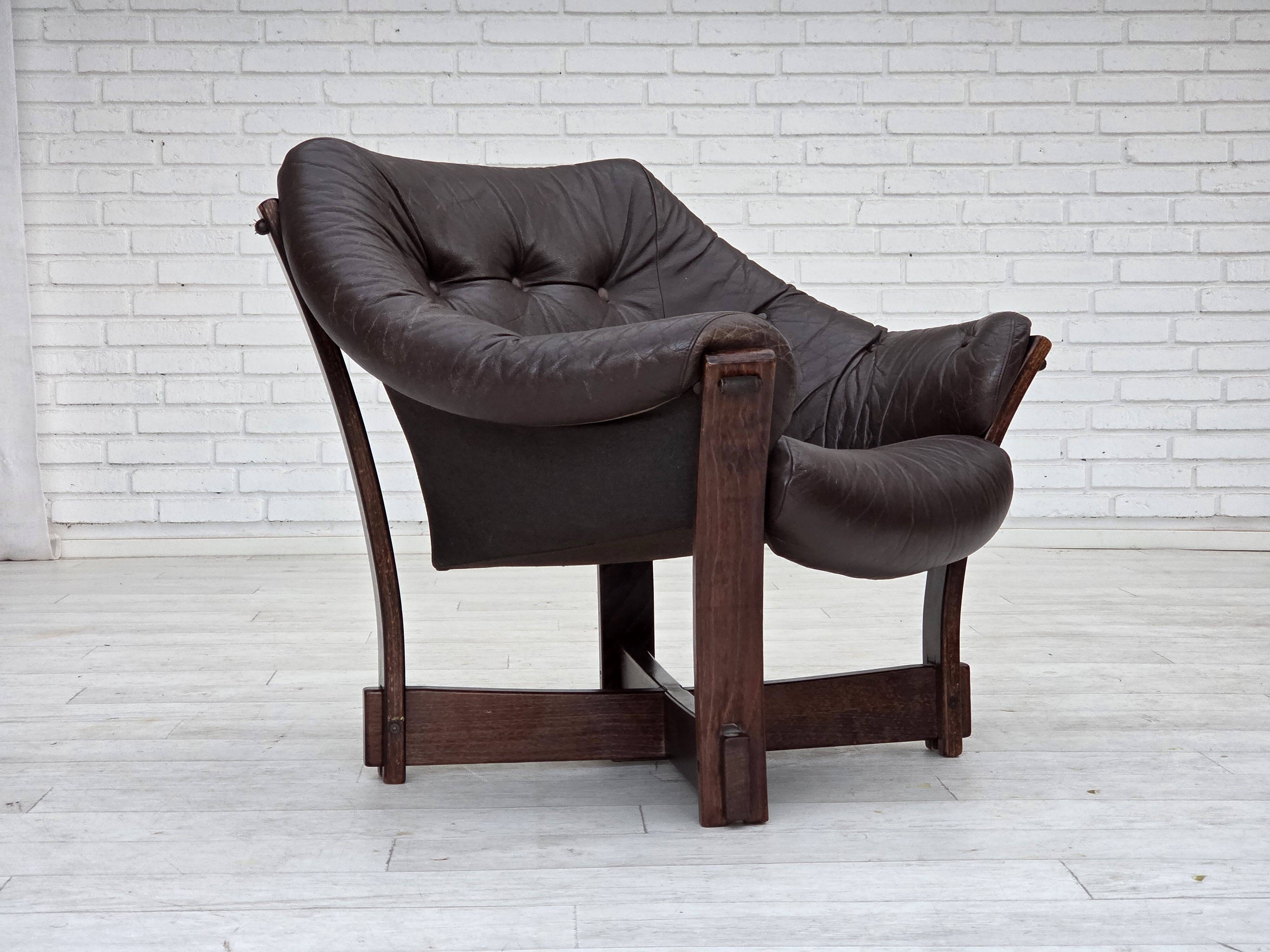 1970s, Scandinavian lounge chair, furniture leather, oak wood.