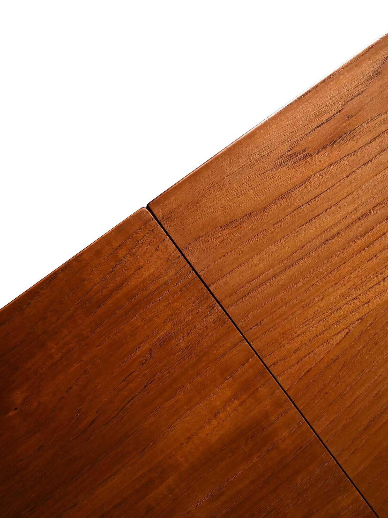 Vintage teak table by ISA Bergamo with drop-leaf extensions