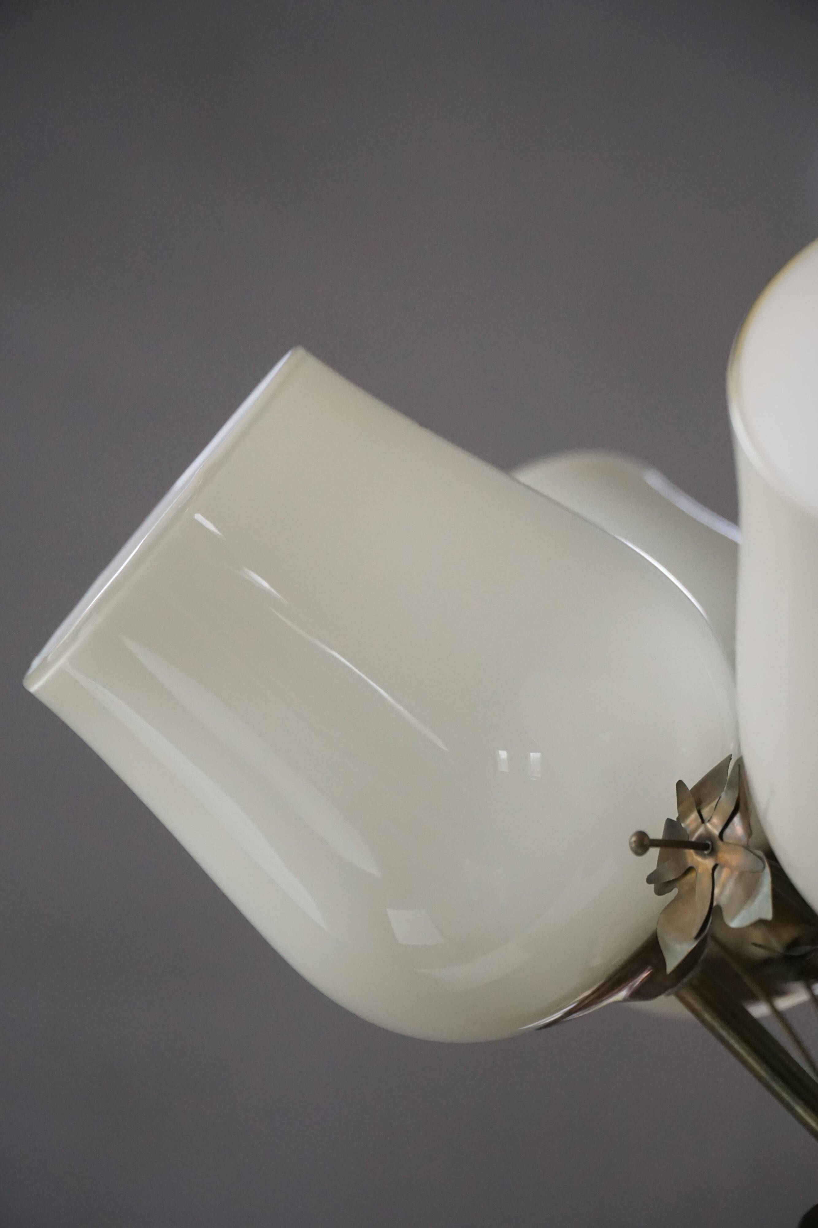 Five-branch brass and glass chandelier by Paavo Tynell for Idman OY Finland, 1940s.